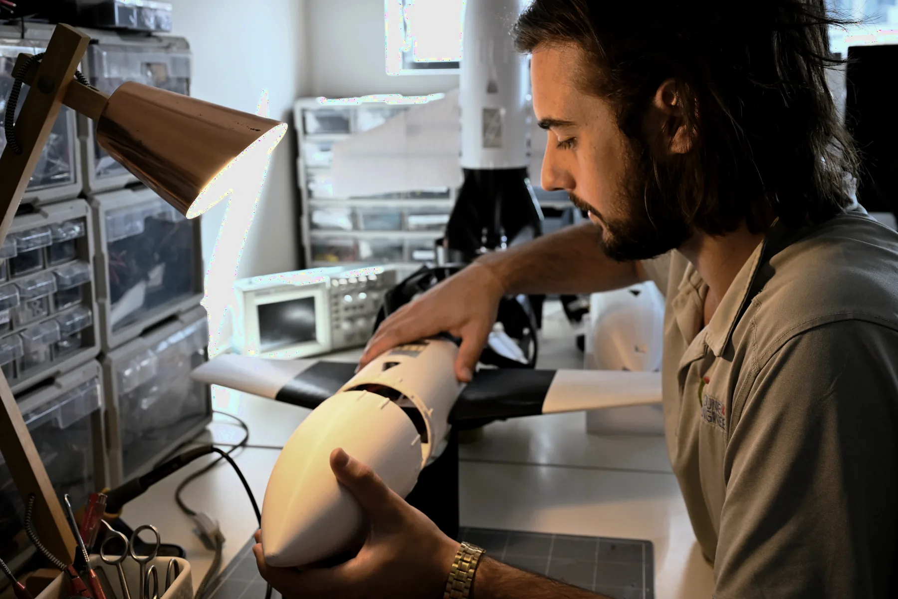 An engineer assembling an aircraft on the build floor at the West End workshop